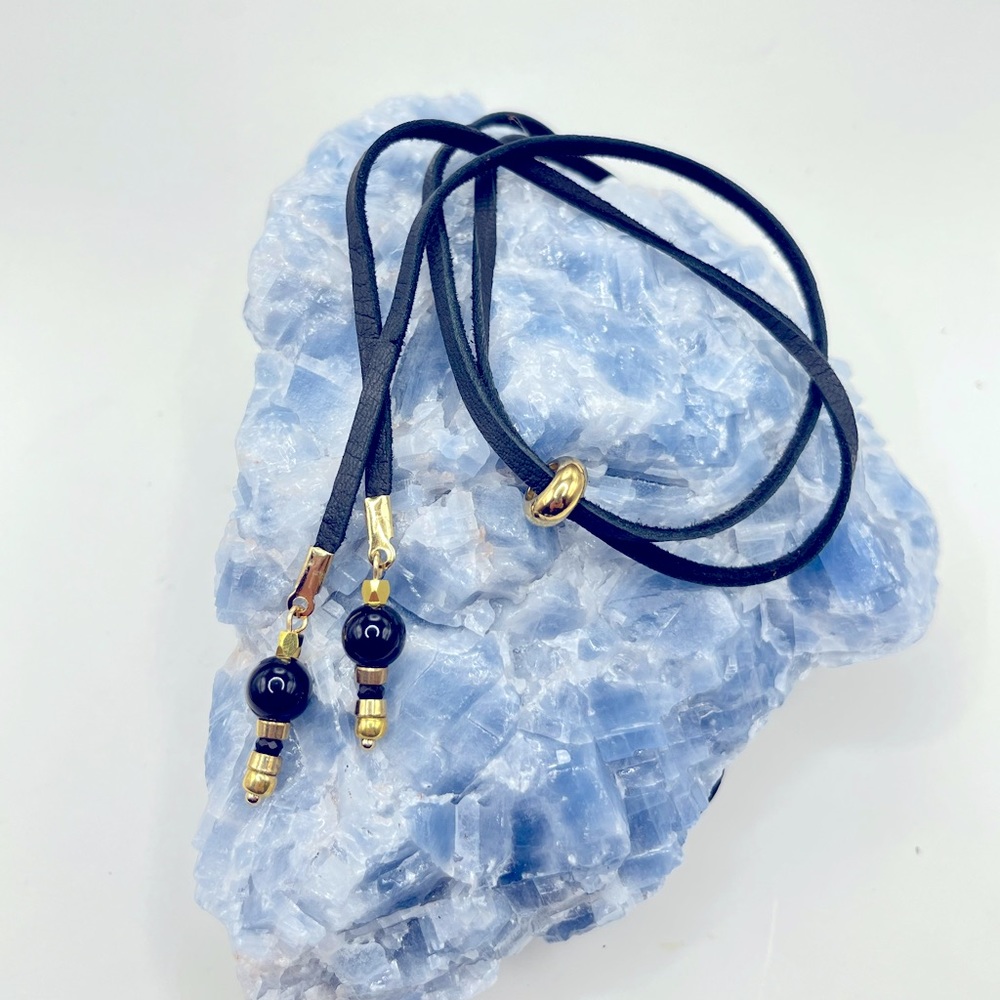 Black, leather cord slider bead necklace